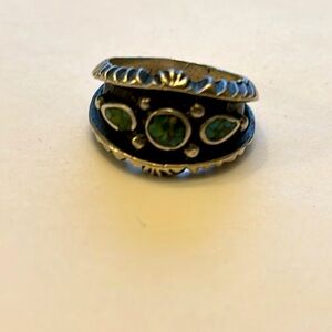 Handcrafted, black inter turquoise ring
